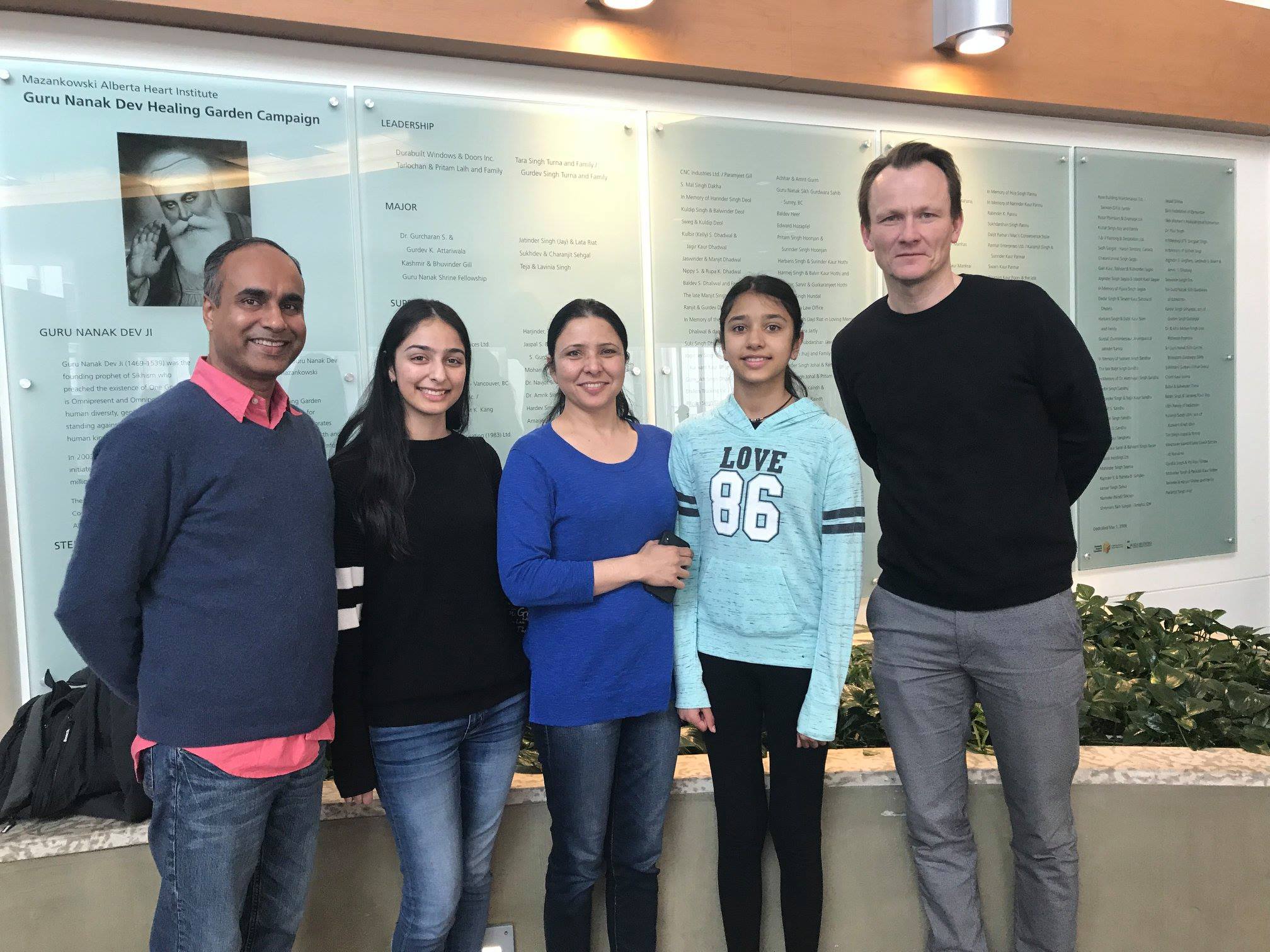 The Muskan family with Dr. Holger Buchholz